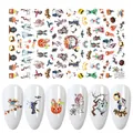 Halloween nail art stickers F684 featuring pumpkins, ghosts, and bats on white nails - Halloween Cartoon Series (F684)