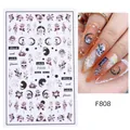 Gothic nail stickers F808 featuring black flowers and skulls on orange nails - Black White Skull Cat Style(F808)