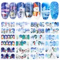 Detail showing winter Christmas nail art water decals with snowman and reindeer patterns - Winter Nordic Building Style (A1177-1188)