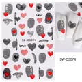 Macro view of 3D nail art stickers with fingerprint heart patterns and LOVE lettering - Fingerprint Heart Style (SW-CS074)