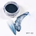 Detail view of dark teal chrome nail powder with blue-white gradient effect and applicator brush - Blue Green Metallic (S97-02)
