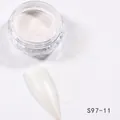 Macro shot of pearl nail powder S97-11 with pearlescent effect on transparent display - Pearl White Luster (S97-11)