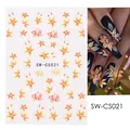 Detail of maple leaf nail stickers with HELLO Fall text on black nail polish - Autumn Orange Red Gradient Maple Leaf (SW-CS021)