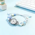 Women quartz watch with blue beads and adjustable drawstring strap on a desk scene - Silver White Dial (Strip Markers)