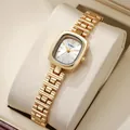 Elegant gold chain watch for women featuring a rectangular silver dial in a luxury gift box - Gold White