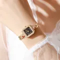 Macro view of vintage square watch with gold metal case and crystal-encrusted bezel - Gold Black