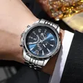 Men's business watch with blue sunray dial and silver steel band on wrist - Silver & Blue