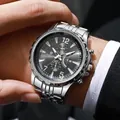 Macro detail of men's chronograph watch with silver steel strap and black dial - Silver Black
