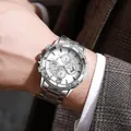 Close-up of business quartz watch with stainless steel strap on a man's wrist - Silver White
