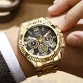 Close-up of golden stainless steel quartz watch with black dial worn on a wrist - Black Dial Gold Case