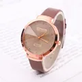 Montre à quartz pour femme avec boîtier or rose et bracelet en cuir marron élégante - Café