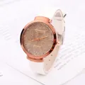 Fashionable women's rose gold starry quartz watch with a sleek white leather strap - White