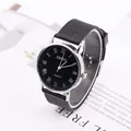 Classic Geneva quartz watch with black roman numeral dial and textured silicone strap - Black Strap Black Dial