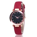 Elegant starry sky watch with rhinestones, faceted glass, and red suede strap on white background - Red