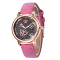 Montre femme ciel étoilé avec bracelet rose en daim et cadran papillon évidé - Rose