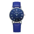 Classic men's quartz watch with blue leather strap and Roman numeral dial on white background - Black Dial Blue Band