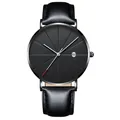 Close-up of minimalist black watch face with radial geometric lines and date calendar display - Black Case Black Dial Black Leather Strap