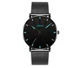 Close-up of Geneva mesh strap watch with black dial and blue hour markers - Black Case Blue Hands Black Band
