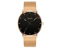 Detail of rose gold mesh strap and minimalist black dial of the Geneva quartz watch - Rose Gold Case Orange Needle Rose Gold Strap