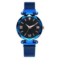 Macro detail of starry blue watch dial with rose gold markers and mesh magnetic strap - Blue