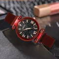 Close-up of women's watch with red Milanese magnetic strap and starry sky dial - Red