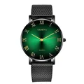 Close-up of green sunburst watch dial with Roman numerals and black mesh metal strap - Black Case Green Dial Black Band