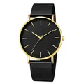 Minimalist quartz watch featuring a black dial, gold case, and black mesh steel band - Gold Case Black Dial Gold Hands