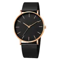 Detail of rose gold quartz watch with minimalist black dial and mesh steel strap - Rose Gold Case Black Dial Rose Gold Hands