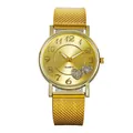 Minimalist gold mesh band watch with heart-patterned dial and quartz movement - Gold