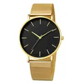 Close-up of minimalist black dial watch with gold indices and Milanese mesh strap - Gold Case Black Dial