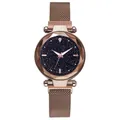 Detail of rose gold starry sky watch face with faceted crystal glass and magnetic strap - Coffee