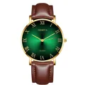 Detail view of emerald green sunray dial with golden Roman numerals and brown leather strap - Gold Case Green Dial Brown Strap