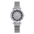 Detail of the Milanese mesh steel strap with secure magnetic clasp on this women's watch - Silver