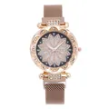Close-up of rose gold mesh strap watch with sparkling floral diamond dial and bezel - Rose Gold