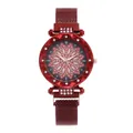 Detail of red women's quartz watch featuring a crystal flower dial and magnetic mesh strap - Red