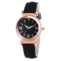 Women's rose gold watch with black starry dial and Roman numerals on black leather strap - Black