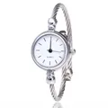 Elegant women's silver quartz bangle watch with a minimalist white dial and twisted band - Index White Face