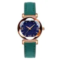 Women's star-patterned quartz watch with rose gold case and green strap on white background - Green