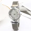 Elegant silver mesh watch for women with glitter dial and rhinestone-studded bezel - Silver