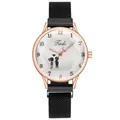 Detail of rose gold watch case with Milanese mesh strap and romantic dial pattern - Black