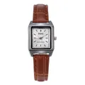 Detailed close-up of a silver square quartz watch with brown crocodile pattern leather strap - White Face Brown Strap