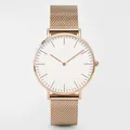 Detail of rose gold mesh band and minimalist white dial on quartz wristwatch - Rose Gold Case White Dial