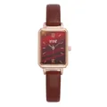 Macro detail of square rose gold watch case with brown textured gradient dial and leather strap - Brown Strap Red Face
