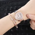 Details einer roségoldenen Quarzuhr mit römischen Ziffern und passendem Stern-Armband - Schwarz + Armband