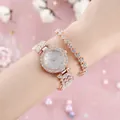 Rose gold watch and bracelet set for women featuring crystals and mother of pearl dial - Rose Gold Watch And Heart Bracelet