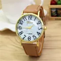 Detail of gold fashion watch with brown leather strap and mother of pearl dial - Khaki