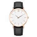 Detail view of quartz watch with black litchi grain leather strap and rose gold case - Black