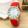 Reloj de cuarzo para mujer con correa de cuero rojo, caja dorada y esfera nácar - Rojo