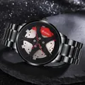 Macro view of racing car wheel hub dial with red brake calipers on sports watch - Red