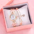 Dettaglio orologio al quarzo oro rosa con cinturino floreale e bracciale stella coordinato - Con Bracciale E Scatola Regalo / Rosa